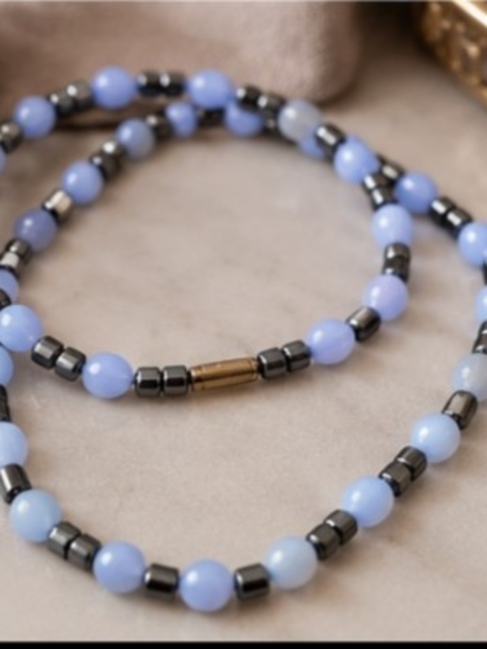 Light Blue Beaded Stretch Bracelet with Hematite Accents